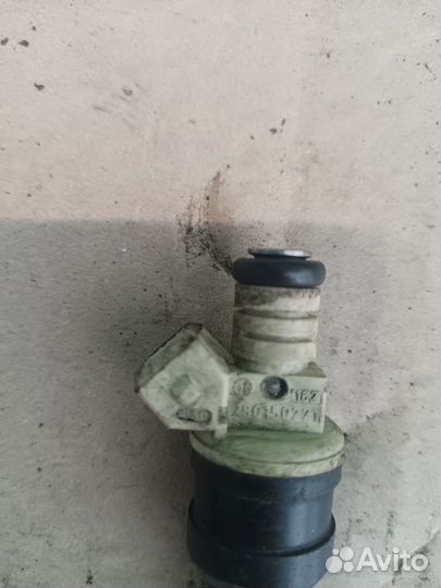 Форсунка инжекторная электрическая Opel Omega 91 г