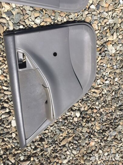 Обшивка двери Toyota Corolla 9 Е120 Е130