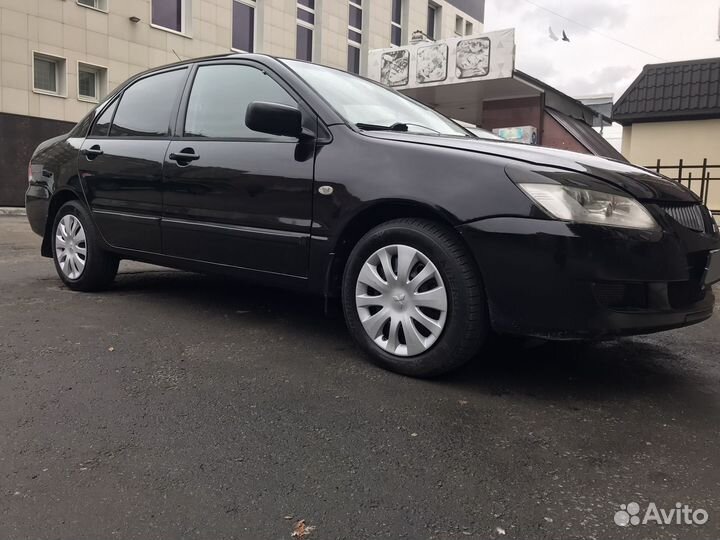 Mitsubishi Lancer 1.6 МТ, 2004, 170 000 км
