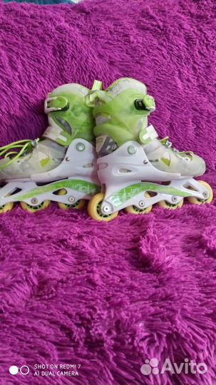 Роликовые коньки