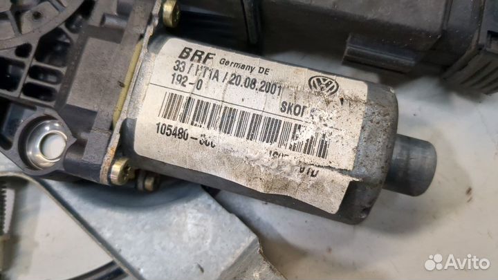 Стеклоподъемник электрический левый передний Skoda Octavia Tour