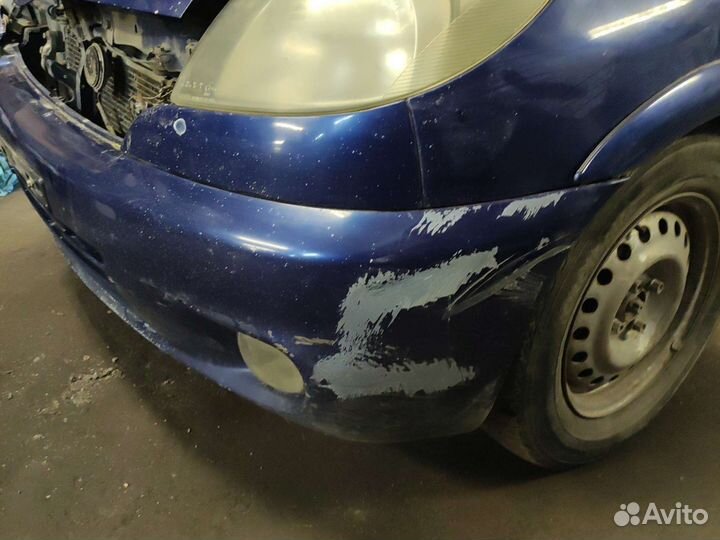 Бампер передний Toyota Yaris Funcargo