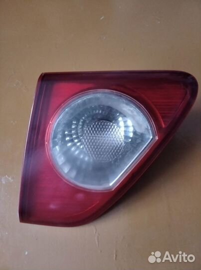 Фонарь задний правый багажника Тойота Королла 150