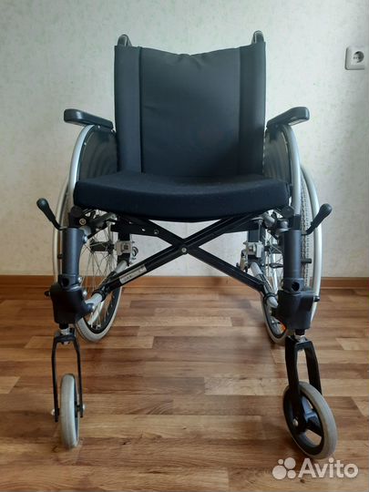 Инвалидное кресло