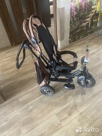 Трехколесный велосипед с ручкой