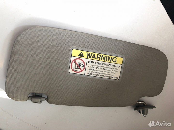 Козырек солнцезащитный передний правый Kia Spectra