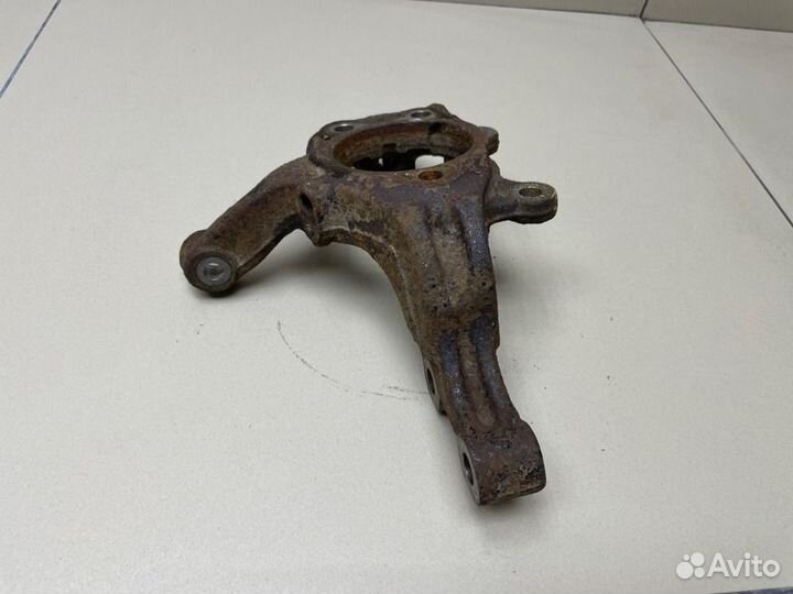 Кулак поворотный передний левый Nissan Tiida