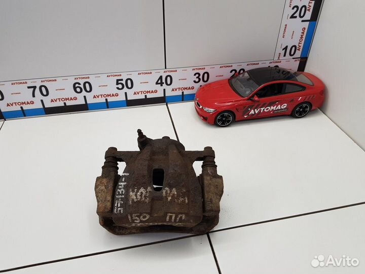 Суппорт передний правый (Toyota Corolla)