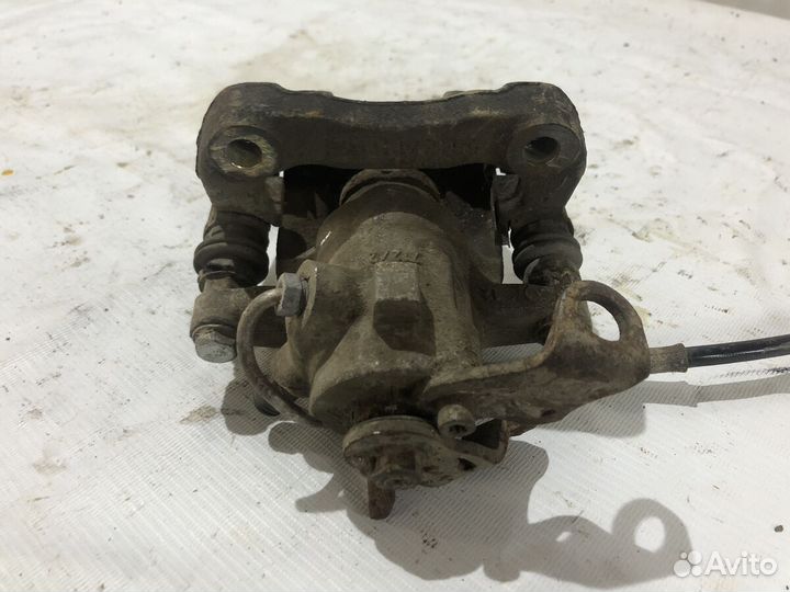 Суппорт тормозной задний левый Peugeot 307