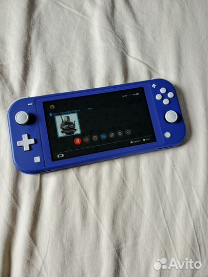 Nintendo switch lite +Witcher 3, complete edition