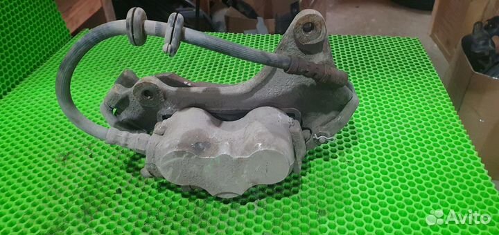 Суппорт тормозной передний правый Chevrolet niva