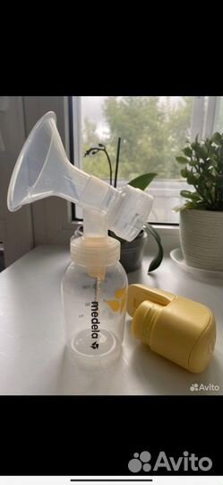 Молокоотсос medela электрический