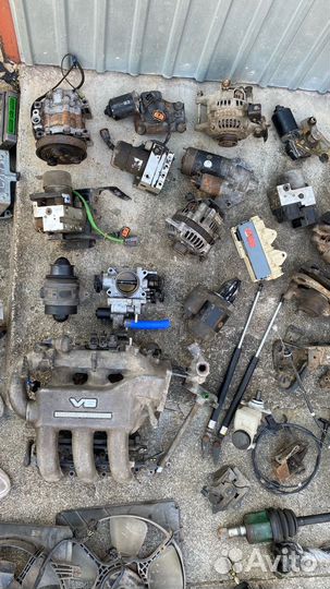 Фара левая mazda 626 GE