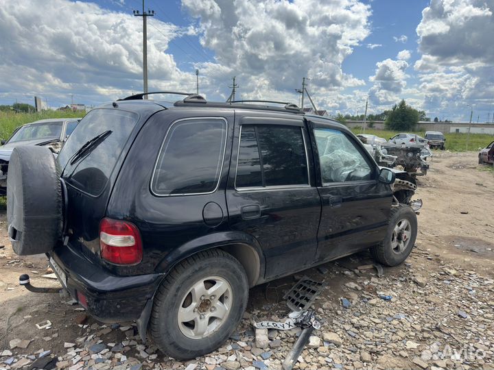 В разборе KIA Sportage FE 2.0 16V АКПП 2002г