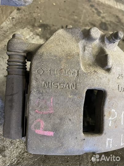 Суппорт передний левый Nissan Primera P12 2