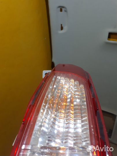 Фонарь бампера задний левый Kia Sportage