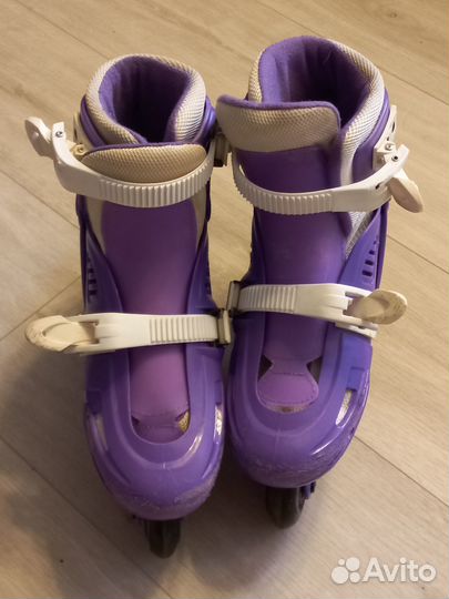 Роликовые коньки