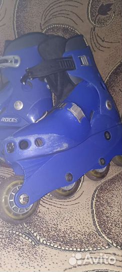 Роликовые коньки