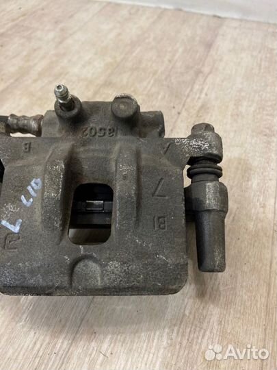 Суппорт задний левый Mitsubishi Lancer 10 CY3A