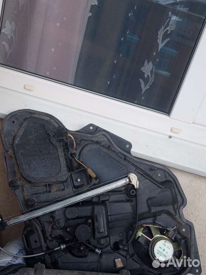 Обшивка двери задней левой от мазда 3