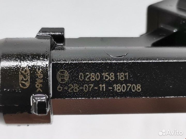 Форсунка Opel Corsa D рест. 2011 24420543