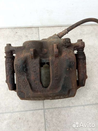 Суппорт тормозной передний левый Renault Espace 3