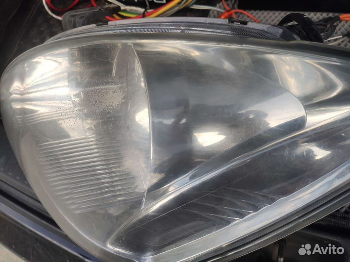 Фара левая перед Mitsubishi Lancer 9