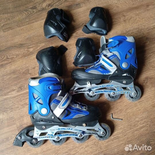 Роликовые коньки