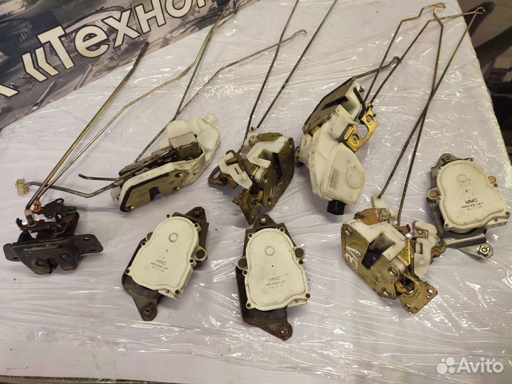 Замок задней двери Mitsubishi Pajero Sport