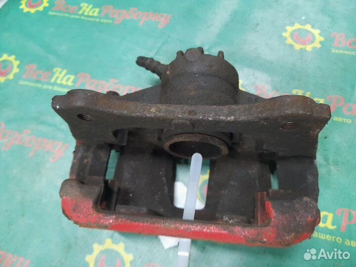 Суппорт передний левый Geely Emgrand Ec7