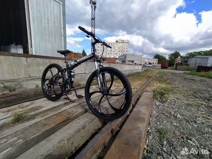 Велосипед на литых дисках 26