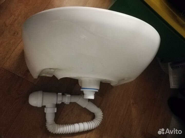 Раковина керамическая