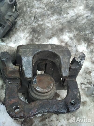 Суппорт задний левый Пежо 307/308