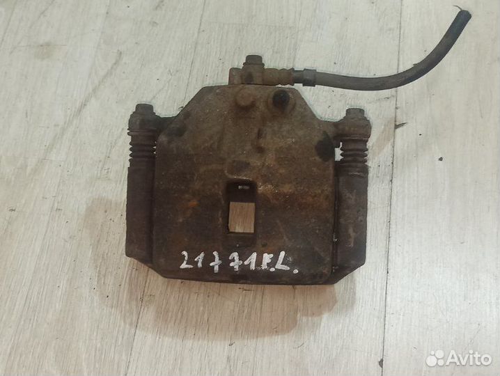 Суппорт передний левый Nissan Primera P12 лифтбек