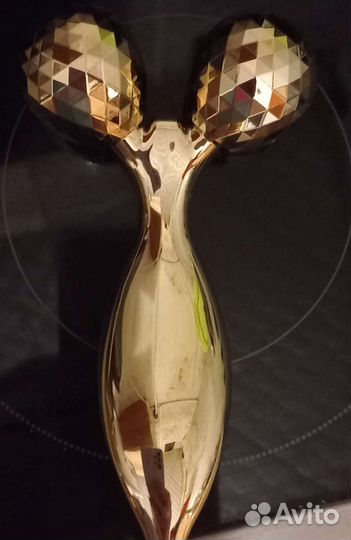 Роликовый массажер для лица