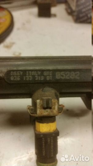 Форсунка инжекторная электрическая VW 036906031AG