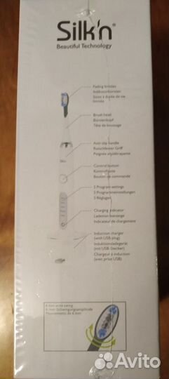 Электрическая зубная щетка