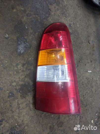 Задний фонарь opel astra g универсал