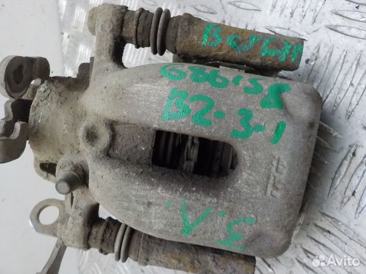 Суппорт тормозной задний левый Citroen Berlingo (N