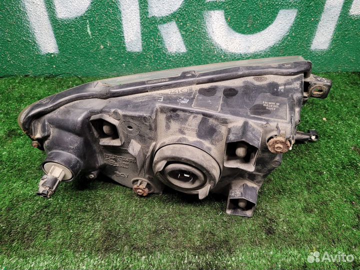 Фара левая Pajero Io