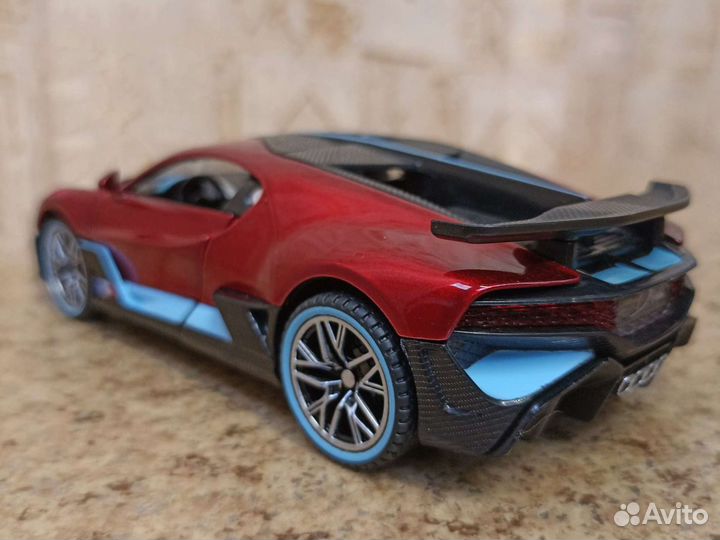 Bugatti Divo красный в масштабе 1 32