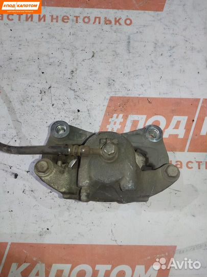 Суппорт тормозной передний правый Nissan Teana J32