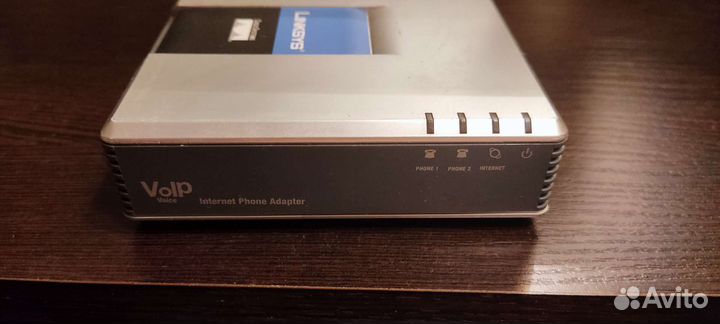 Телефонный адаптер Linksys Cisco