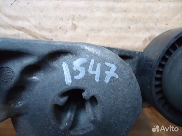 Ролик-натяжитель ручейкового ремня Volkswagen