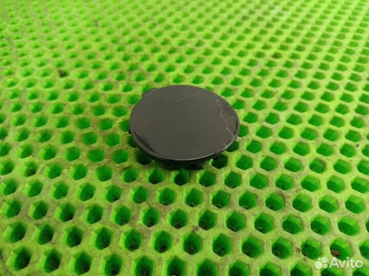 Заглушка буксировочного крюка заднего