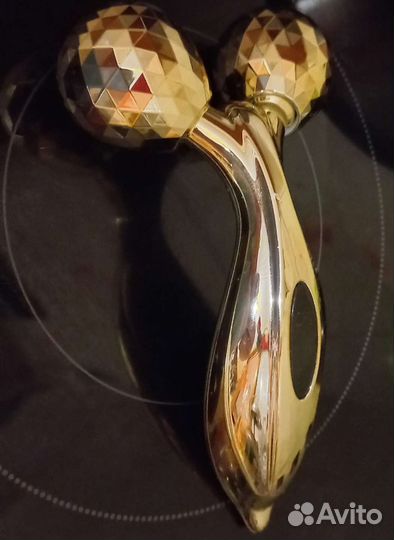 Роликовый массажер для лица