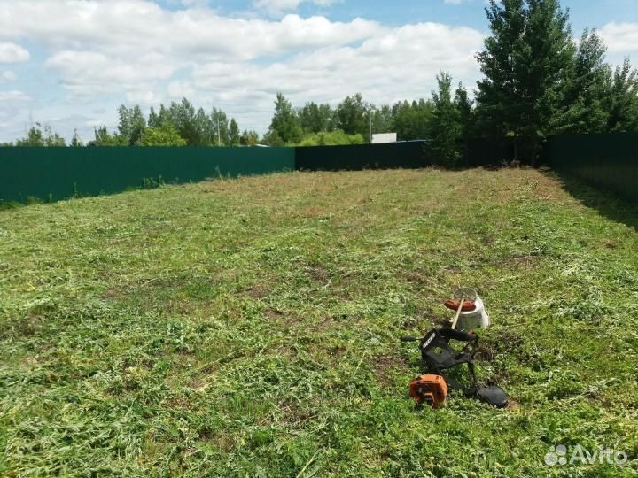 Покос травы тиммером