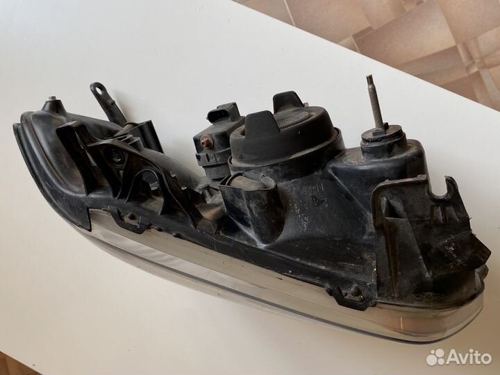 Фара Mazda Tribute I Рестайлинг