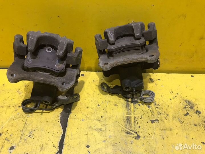 Суппорт тормозной задний Volkswagen Passat 2000-20