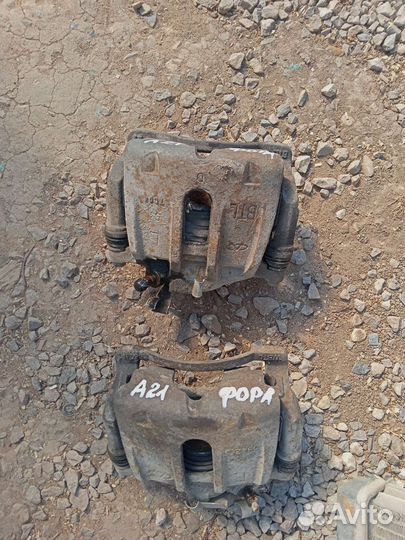 Суппорт тормозной передний чери фора А21